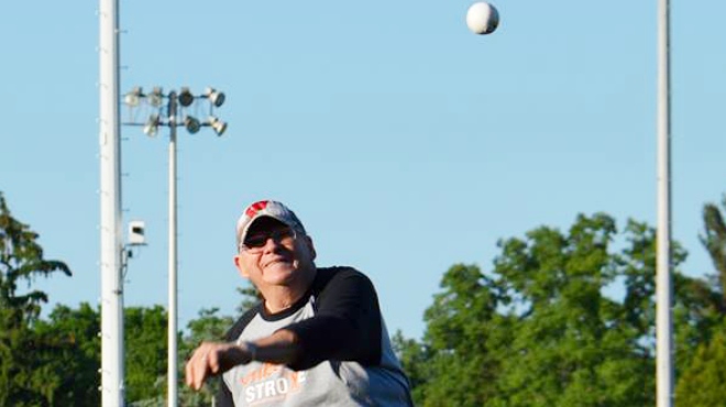 Ken Eckes throws the first pitch