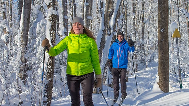 Couple cross-country skiing