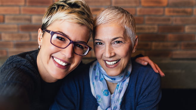 Two women smiling