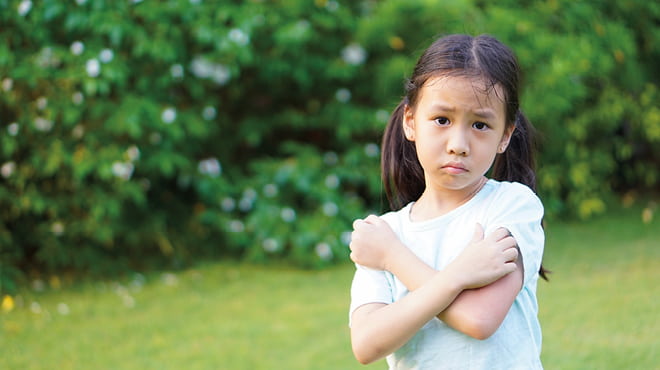 Young girl with itchy skin