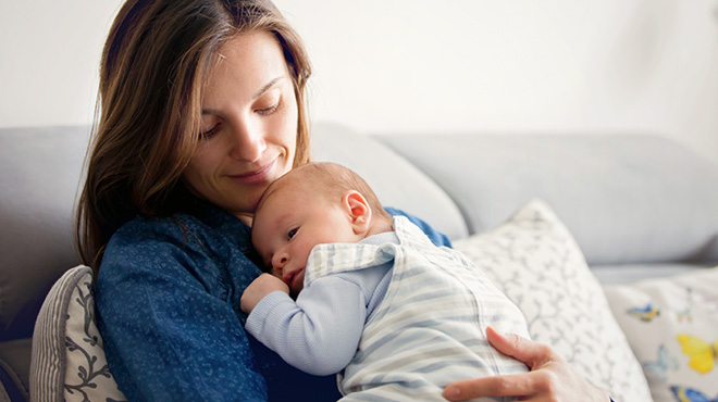 Baby resting on mom's chest