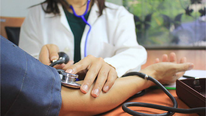 Blood pressure cuff on arm