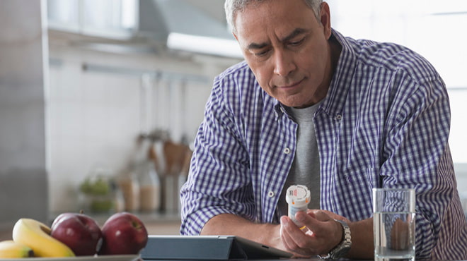 Looking at prescription bottle