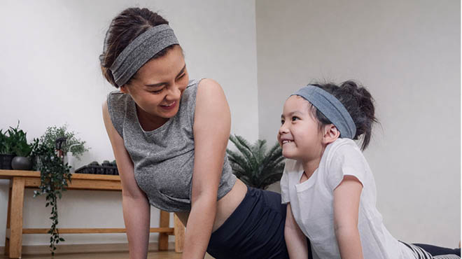 Mother and child exercising