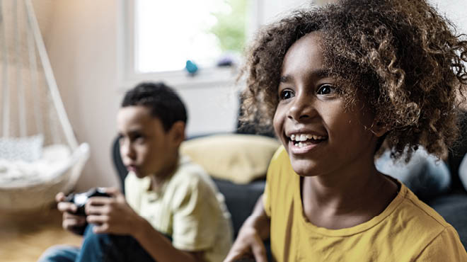 Two kids playing video games