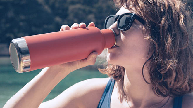 Drinking from water bottle