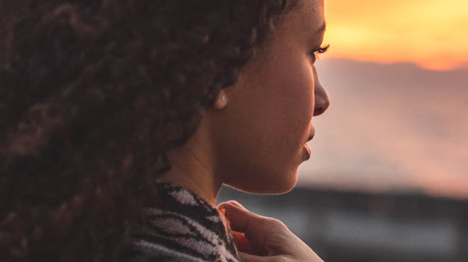 Looking at sunset sky