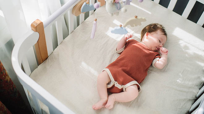 Baby sleeping in crib