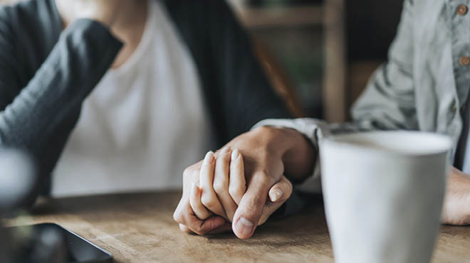 Close up of holding hands