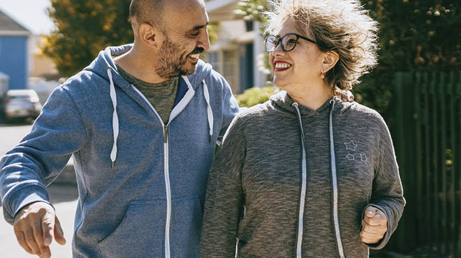 Couple walking and smiling