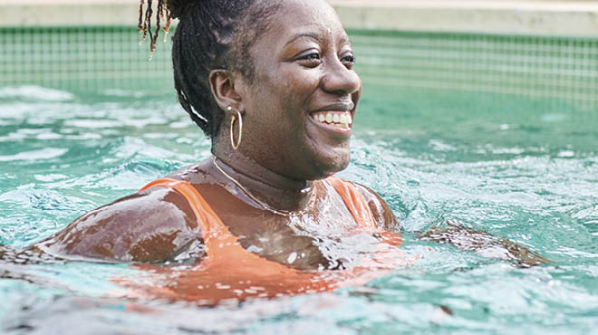 Person standing in pool