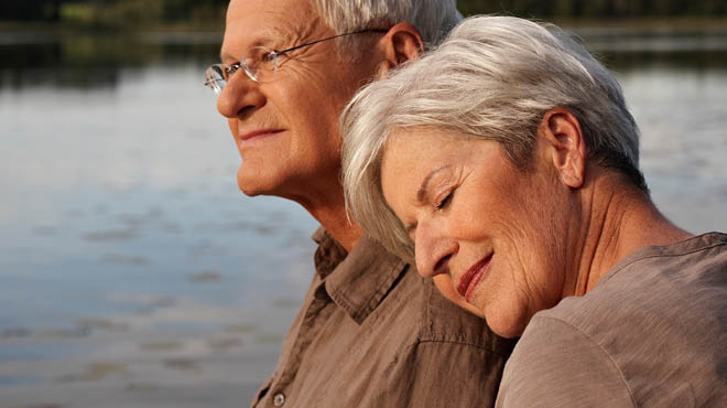 Senior couple by lake