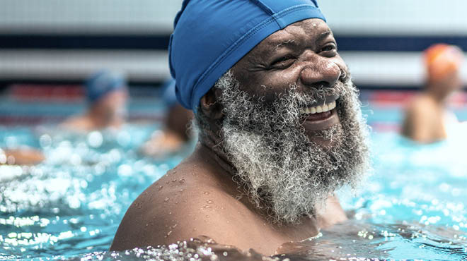 Swimmer wearing swim cap in pool