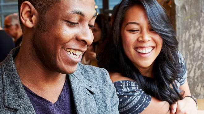 Young adult couple smiling