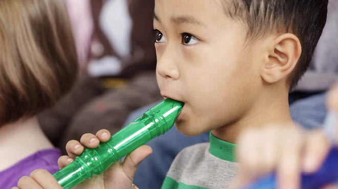 Child playing recorder