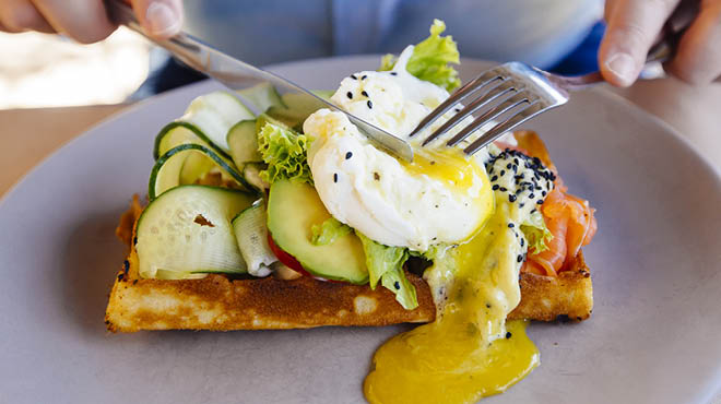 Egg yolk running on toast