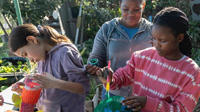 Kids crafting outdoors