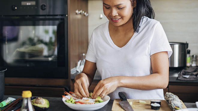 Preparing shrimp meal in bowl