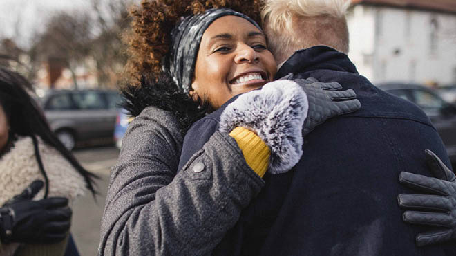 Two people hugging